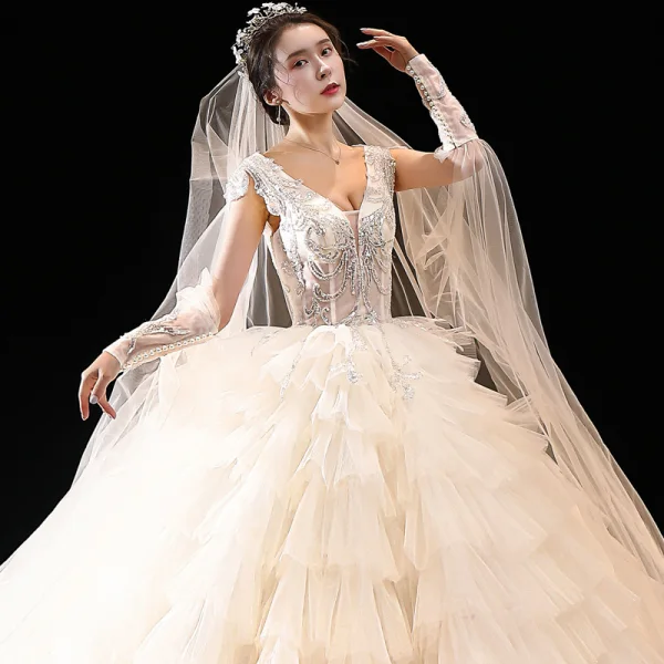 Étourdissant Champagne La Mariée Robe De Mariée 2020 Robe Boule Transparentes Col v profond Détachable Sans Manches Dos Nu Appliques Paillettes Perlage Royal Train Volants en Cascade