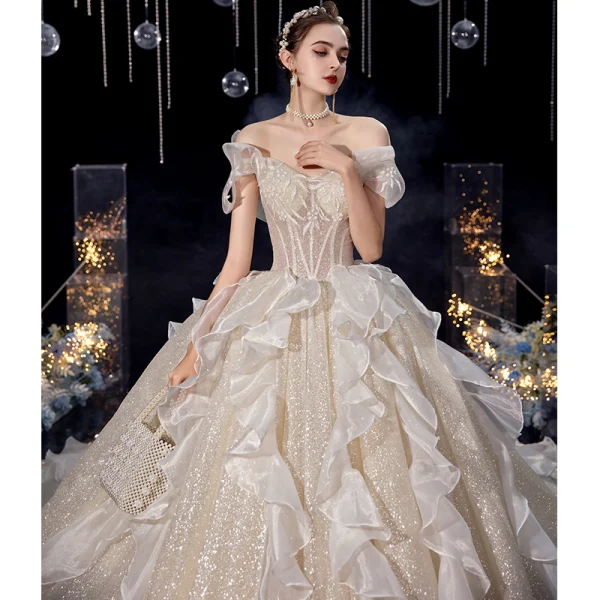 Charming Champagne Organza Bridal Wedding Dresses 2020 Ball Gown Off-The-Shoulder Short Sleeve Backless Glitter Tulle Cathedral Train Ruffle