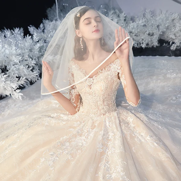 Romantic Champagne Bridal Wedding Dresses 2020 Ball Gown See-through Scoop Neck 1/2 Sleeves Backless Appliques Lace Beading Chapel Train Ruffle