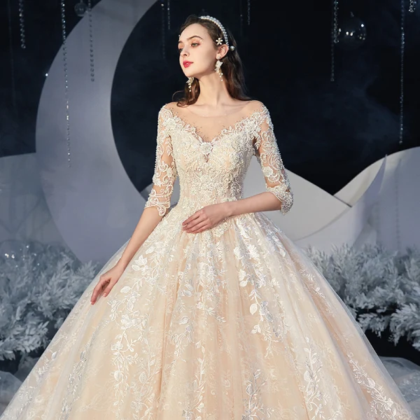 Romantic Champagne Bridal Wedding Dresses 2020 Ball Gown See-through Scoop Neck 1/2 Sleeves Backless Appliques Lace Beading Chapel Train Ruffle