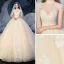 Vintage / Originale Champagne La Mariée Robe De Mariée 2020 Robe Boule Transparentes Col Haut Manches Courtes Dos Nu Appliques En Dentelle Perlage Gland Cathedral Train