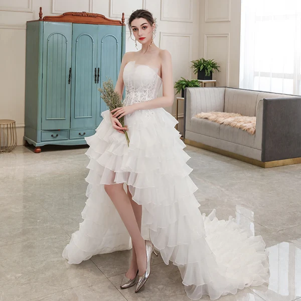 Affordable Ivory Bridal Wedding Dresses 2020 Ball Gown Strapless Sleeveless Backless Appliques Lace Beading Asymmetrical Ruffle