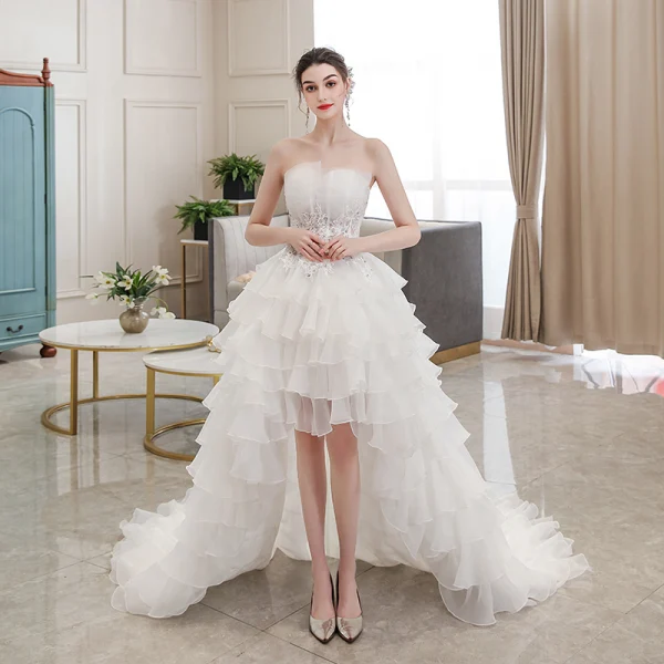 Affordable Ivory Bridal Wedding Dresses 2020 Ball Gown Strapless Sleeveless Backless Appliques Lace Beading Asymmetrical Ruffle
