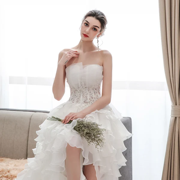 Affordable Ivory Bridal Wedding Dresses 2020 Ball Gown Strapless Sleeveless Backless Appliques Lace Beading Asymmetrical Ruffle
