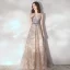 Élégant Champagne Robe De Soirée 2020 Princesse Transparentes Encolure Dégagée Sans Manches Ceinture Appliques En Dentelle Paillettes Train De Balayage Volants Dos Nu Robe De Ceremonie