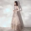 Élégant Champagne Robe De Soirée 2020 Princesse Transparentes Encolure Dégagée Sans Manches Ceinture Appliques En Dentelle Paillettes Train De Balayage Volants Dos Nu Robe De Ceremonie