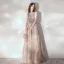 Élégant Champagne Robe De Soirée 2020 Princesse Transparentes Encolure Dégagée Sans Manches Ceinture Appliques En Dentelle Paillettes Train De Balayage Volants Dos Nu Robe De Ceremonie
