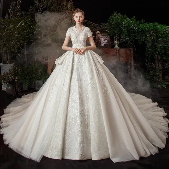 Vintage Originale Ivoire La Mariée Robe De Mariée 2020 Robe Boule V Cou Manches Courtes Dos Nu Paillettes Perlage Glitter Tulle Cathedral Train Volants