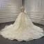 Luxe Ivoire La Mariée Robe De Mariée 2020 Robe Boule Encolure Carrée Sans Manches Dos Nu Fait main Perlage Paillettes Chapel Train Volants