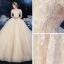 Schöne Champagner Hochzeits Brautkleider / Hochzeitskleider 2020 Ballkleid Durchsichtige Rundhalsausschnitt Kurze Ärmel Rückenfreies Applikationen Spitze Perlenstickerei Glanz Tülle Kathedrale Schleppe Rüschen