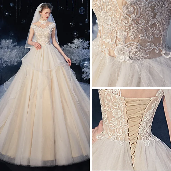 Vintage / Originale Ivoire La Mariée Robe De Mariée 2020 Princesse Transparentes Col Haut Sans Manches Dos Nu Appliques En Dentelle Perlage Chapel Train Volants