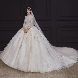 Style Victorien Champagne La Mariée Robe De Mariée 2020 Robe Boule Transparentes Col Haut Gonflée Manches Longues Dos Nu Fait Main Perlage Perle Appliques En Dentelle Royal Train