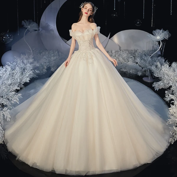 Romantic Champagne Bridal Wedding Dresses 2020 Ball Gown Off-The-Shoulder Short Sleeve Backless Glitter Tulle Appliques Lace Beading Cathedral Train Ruffle
