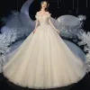 Romantic Champagne Bridal Wedding Dresses 2020 Ball Gown Off-The-Shoulder Short Sleeve Backless Glitter Tulle Appliques Lace Beading Cathedral Train Ruffle