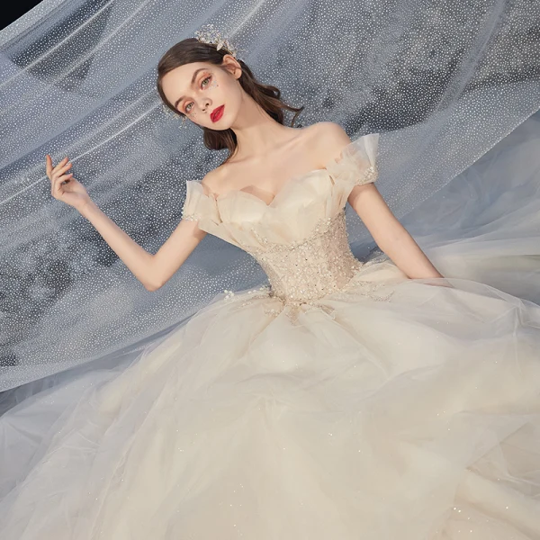 Romantic Champagne Bridal Wedding Dresses 2020 Ball Gown Off-The-Shoulder Short Sleeve Backless Glitter Tulle Appliques Lace Beading Cathedral Train Ruffle