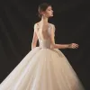 Elegant Champagne Bridal Wedding Dresses 2020 Ball Gown Scoop Neck Sleeveless Backless Glitter Tulle Beading Sequins Cathedral Train Ruffle