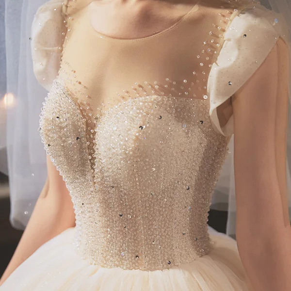 Elegant Champagne Bridal Wedding Dresses 2020 Ball Gown Scoop Neck Sleeveless Backless Glitter Tulle Beading Sequins Cathedral Train Ruffle