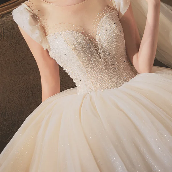 Elegant Champagne Bridal Wedding Dresses 2020 Ball Gown Scoop Neck Sleeveless Backless Glitter Tulle Beading Sequins Cathedral Train Ruffle