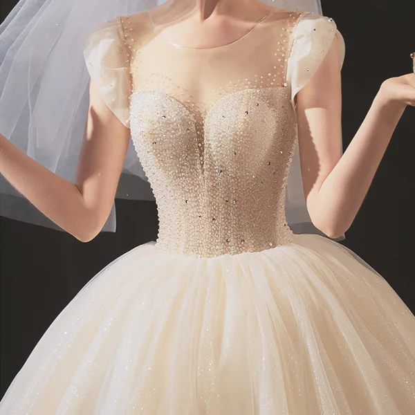 Elegant Champagne Bridal Wedding Dresses 2020 Ball Gown Scoop Neck Sleeveless Backless Glitter Tulle Beading Sequins Cathedral Train Ruffle