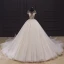Luxury / Gorgeous Ivory Bridal Wedding Dresses 2020 Ball Gown See-through Scoop Neck Short Sleeve Backless Glitter Tulle Beading Cathedral Train Ruffle