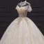 Luxury / Gorgeous Champagne Bridal Wedding Dresses 2020 Ball Gown See-through High Neck Short Sleeve Backless Appliques Lace Handmade Beading Chapel Train Ruffle
