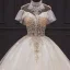 Luxury / Gorgeous Champagne Bridal Wedding Dresses 2020 Ball Gown See-through High Neck Short Sleeve Backless Appliques Lace Handmade Beading Chapel Train Ruffle