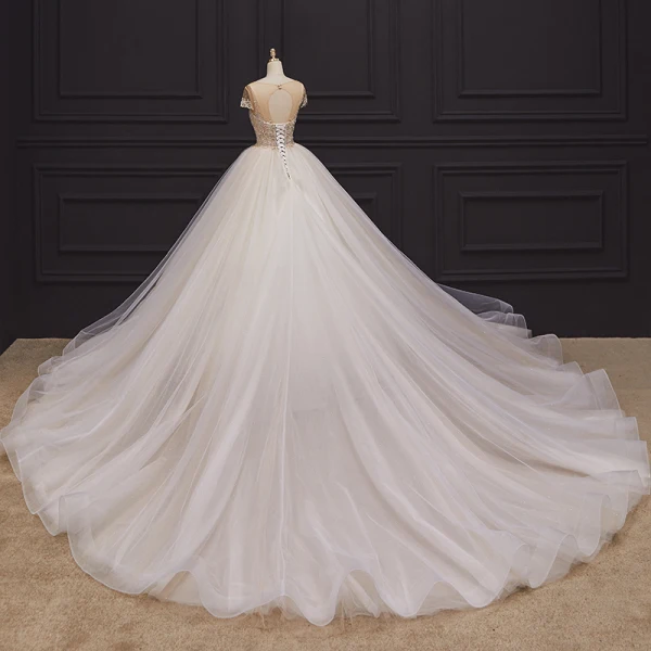 Luxury / Gorgeous Champagne Bridal Wedding Dresses 2020 Ball Gown See-through Scoop Neck Short Sleeve Backless Handmade Beading Chapel Train Ruffle