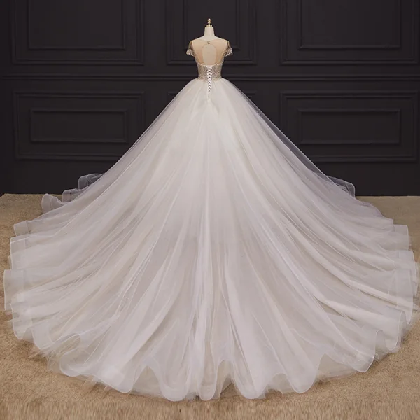 Luxury / Gorgeous Champagne Bridal Wedding Dresses 2020 Ball Gown See-through Scoop Neck Short Sleeve Backless Handmade Beading Chapel Train Ruffle