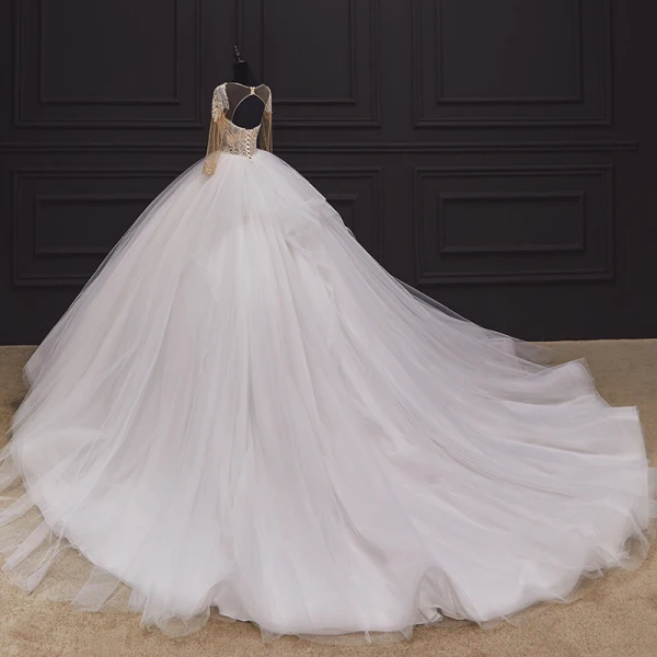 Illusion Ivory Bridal Wedding Dresses 2020 Ball Gown See-through Scoop Neck Long Sleeve Backless Handmade Beading Cathedral Train Ruffle
