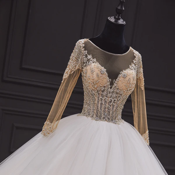 Illusion Ivory Bridal Wedding Dresses 2020 Ball Gown See-through Scoop Neck Long Sleeve Backless Handmade Beading Cathedral Train Ruffle