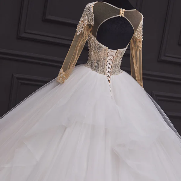 Illusion Ivory Bridal Wedding Dresses 2020 Ball Gown See-through Scoop Neck Long Sleeve Backless Handmade Beading Cathedral Train Ruffle
