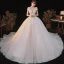 Romantique Champagne La Mariée Robe De Mariée 2020 Robe Boule Transparentes Col v profond Manches Courtes Dos Nu Appliques En Dentelle Perlage Étoile Paillettes Glitter Tulle Cathedral Train Volants