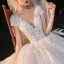 Romantique Champagne La Mariée Robe De Mariée 2020 Robe Boule Transparentes Col v profond Manches Courtes Dos Nu Appliques En Dentelle Perlage Étoile Paillettes Glitter Tulle Cathedral Train Volants