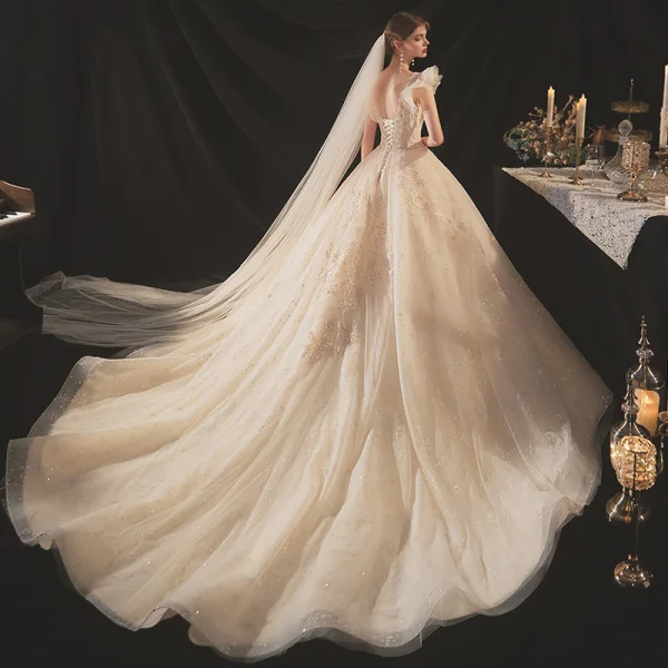 Chic / Belle Champagne La Mariée Robe De Mariée 2020 Robe Boule Transparentes Encolure Dégagée Sans Manches Dos Nu Appliques En Dentelle Perlage Glitter Tulle Chapel Train Volants