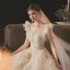Chic / Belle Champagne La Mariée Robe De Mariée 2020 Robe Boule Transparentes Encolure Dégagée Sans Manches Dos Nu Appliques En Dentelle Perlage Glitter Tulle Chapel Train Volants