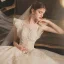 Chic / Belle Champagne La Mariée Robe De Mariée 2020 Robe Boule Transparentes Encolure Dégagée Sans Manches Dos Nu Appliques En Dentelle Perlage Glitter Tulle Chapel Train Volants