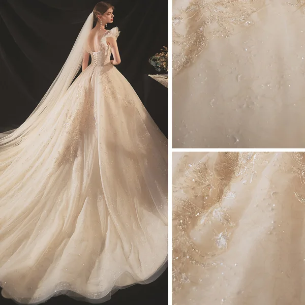 Chic / Belle Champagne La Mariée Robe De Mariée 2020 Robe Boule Transparentes Encolure Dégagée Sans Manches Dos Nu Appliques En Dentelle Perlage Glitter Tulle Chapel Train Volants