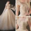 Chic / Belle Champagne La Mariée Robe De Mariée 2020 Robe Boule Transparentes Encolure Dégagée Sans Manches Dos Nu Appliques En Dentelle Perlage Glitter Tulle Chapel Train Volants
