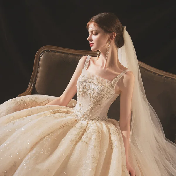 Classic Champagne Bridal Wedding Dresses 2020 Ball Gown Shoulders Sleeveless Backless Appliques Beading Glitter Tulle Cathedral Train Ruffle