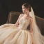 Classic Champagne Bridal Wedding Dresses 2020 Ball Gown Shoulders Sleeveless Backless Appliques Beading Glitter Tulle Cathedral Train Ruffle