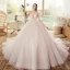 Luxe Champagne La Mariée Robe De Mariée 2020 Robe Boule Transparentes Col v profond Bretelles Spaghetti Sans Manches Dos Nu Appliques En Dentelle Perlage Glitter Tulle Chapel Train Volants