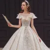 Vintage / Retro Champagne Bridal Wedding Dresses 2020 Ball Gown See-through Square Neckline Short Sleeve Backless Beading Appliques Lace Sequins Glitter Tulle Cathedral Train Ruffle