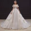 Style Victorien Champagne La Mariée Robe De Mariée 2020 Robe Boule Transparentes Encolure Dégagée Gonflée Manches Courtes Dos Nu Perlage Appliques En Dentelle Paillettes Cathedral Train Volants