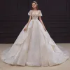 Victorian Style Champagne Bridal Wedding Dresses 2020 Ball Gown See-through Scoop Neck Puffy Short Sleeve Backless Beading Appliques Lace Sequins Cathedral Train Ruffle