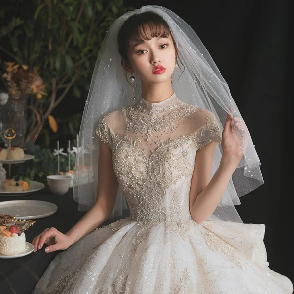 Luxury / Gorgeous Champagne Bridal Wedding Dresses 2020 Ball Gown See-through High Neck Short Sleeve Appliques Lace Beading Sequins Cathedral Train Ruffle
