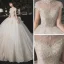 Luxury / Gorgeous Champagne Bridal Wedding Dresses 2020 Ball Gown See-through High Neck Short Sleeve Appliques Lace Beading Sequins Cathedral Train Ruffle