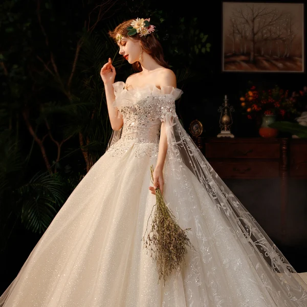 Romantic Champagne Bridal Wedding Dresses 2020 Ball Gown Off-The-Shoulder Short Sleeve Backless Appliques Lace Beading Sequins Glitter Tulle Chapel Train Ruffle