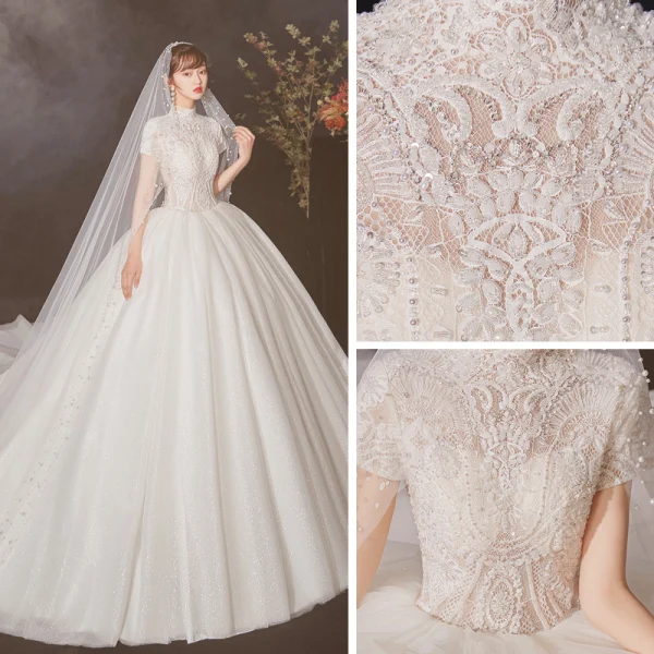 Vintage / Retro Ivory See-through Wedding Dresses 2020 Ball Gown High Neck Short Sleeve Appliques Lace Beading Pearl Cathedral Train Ruffle