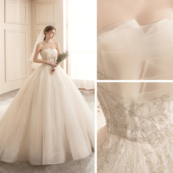 Affordable Champagne Bridal Wedding Dresses 2020 Ball Gown Strapless Sleeveless Backless Appliques Lace Beading Glitter Tulle Chapel Train Ruffle