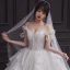 Romantic Champagne Bridal Wedding Dresses 2020 Ball Gown Off-The-Shoulder Bow Short Sleeve Backless Glitter Tulle Cathedral Train Ruffle